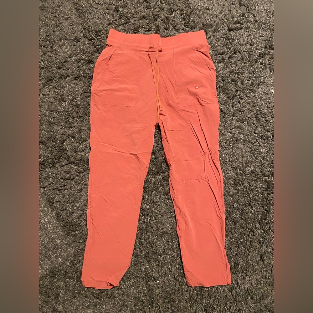 orange nike pants